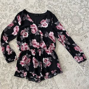Floral Romper-lined. Size Large, can fit a size medium! Great condition!